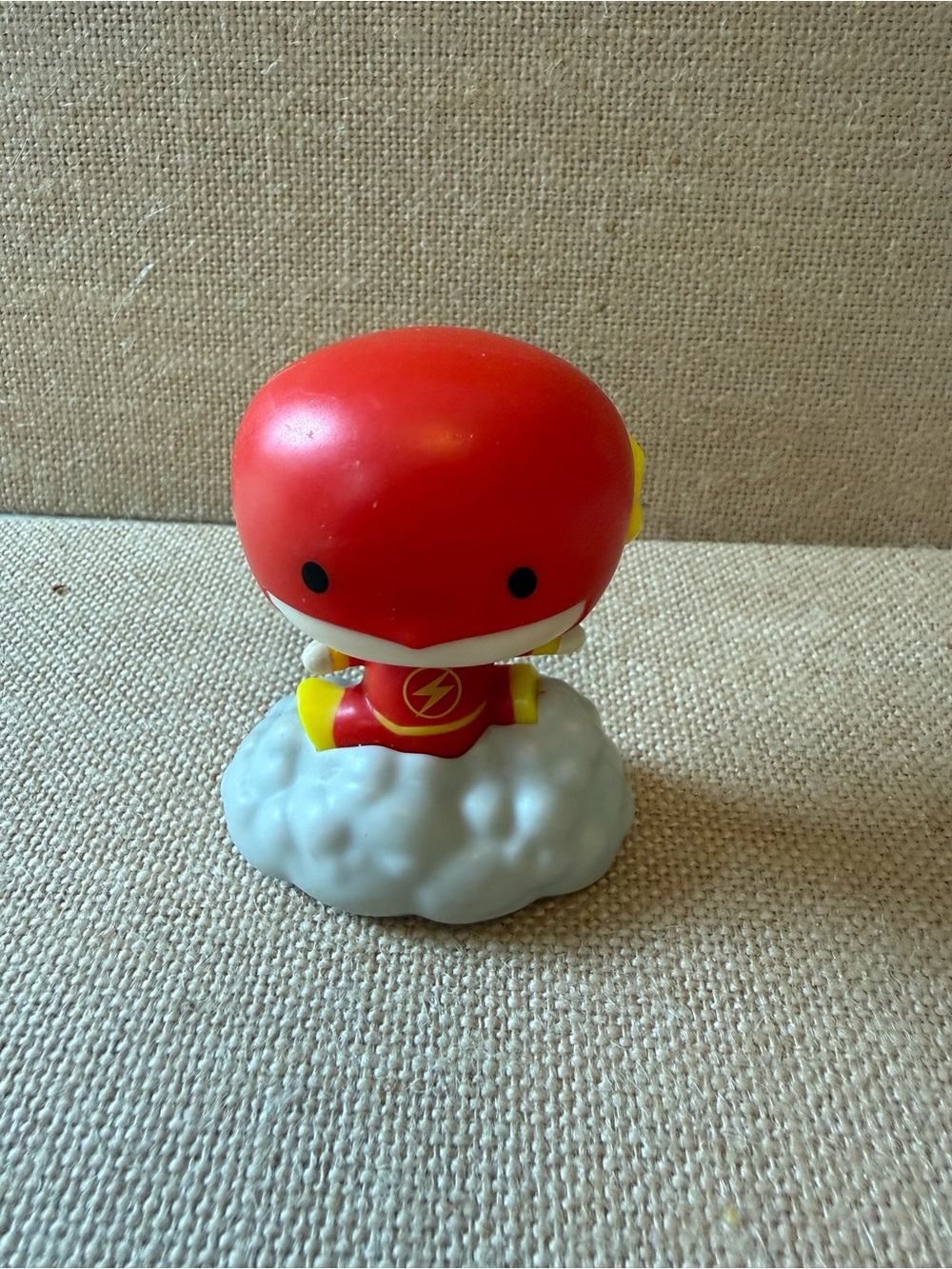 The DC Justice League The Flash Toy is a McDonald's Happy Meal toy